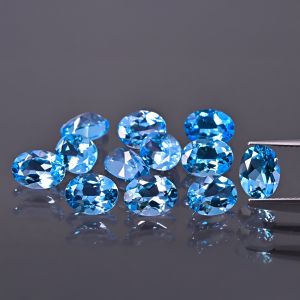 Owalny kamień, stożek - topaz swiss blue 7x5 MM