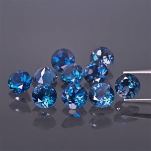 Okrągły kamień, stożek - topaz London Blue 6 MM